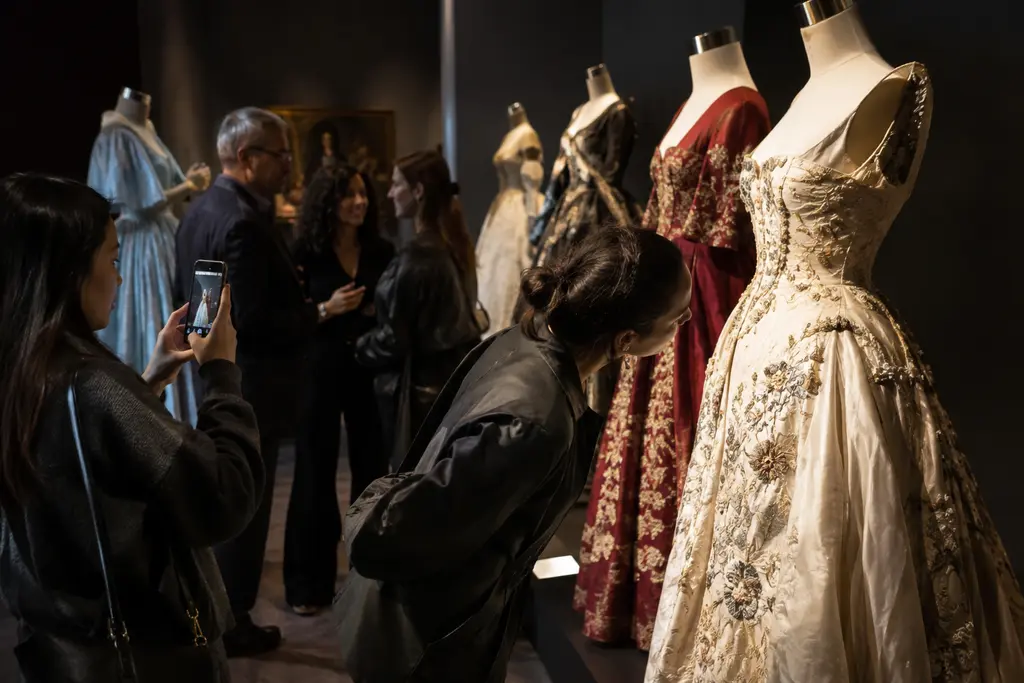 Museum gallery showing Costume Design Trends with sculptural dress forms